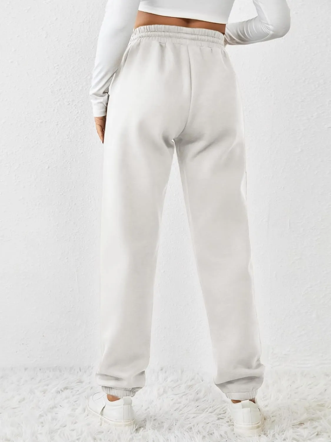 PINSPARK Women's Fleece Lined Sweatpants Winter Joggers Athletic Pants Casual Thick Warm Trousers Pockets
