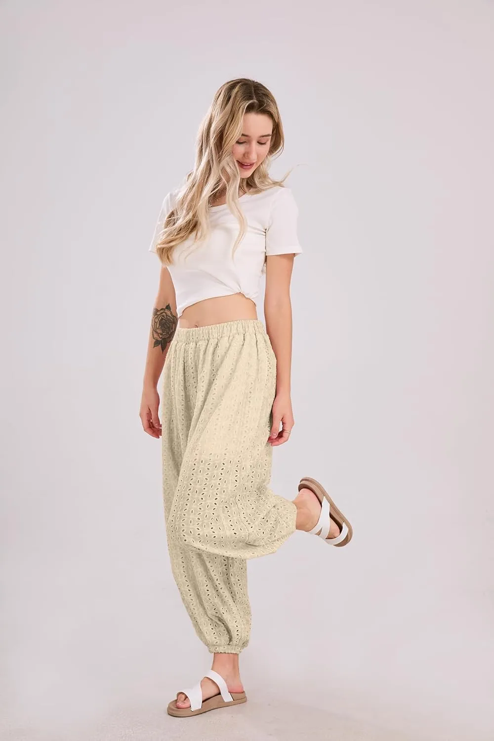 utcoco Womens Eyelet Lace Beach Palazzo Harem Pants Casual Loose Embroidery High Waist Cotton Trousers with Pockets
